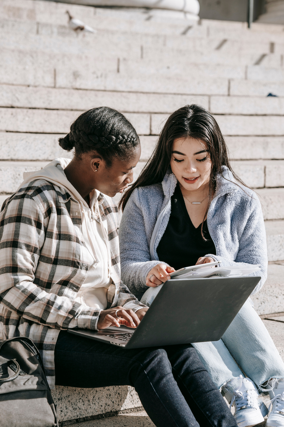 Focused diverse students working together